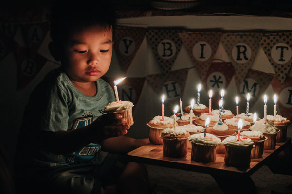 Child with birthday candles